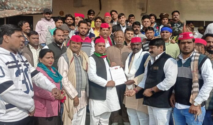 Submitting a memorandum to the Additional District Magistrate