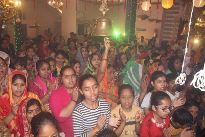 Devotees offering prayers in the temple