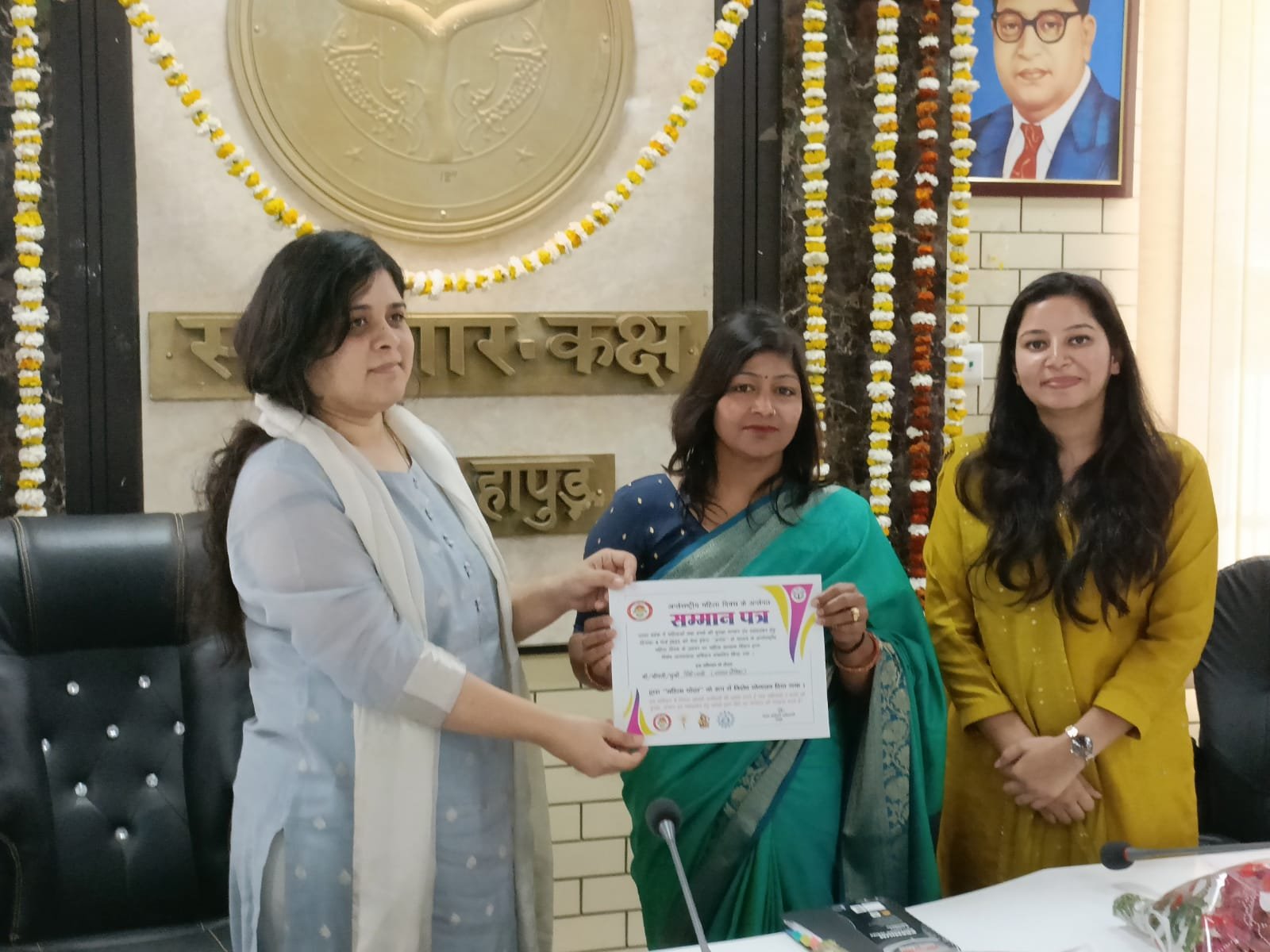 District Magistrate giving certificate1