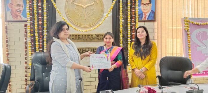 District Magistrate giving certificate2