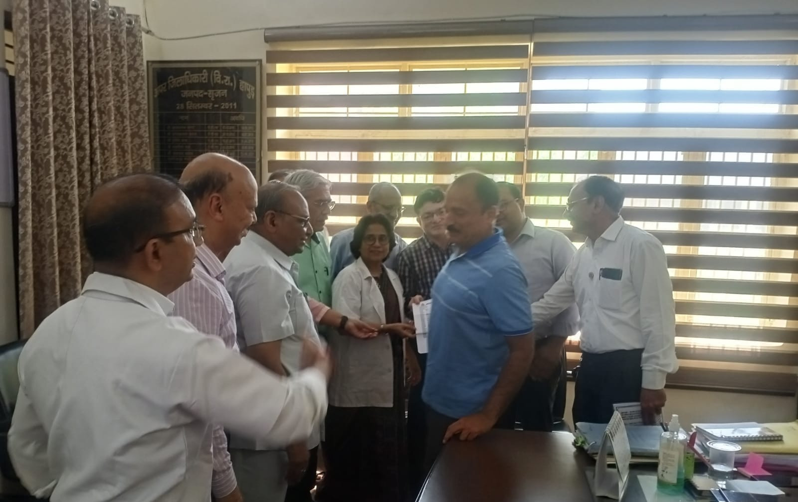 Office bearers and members of ima handing over the memorandum to the additional district magistrate