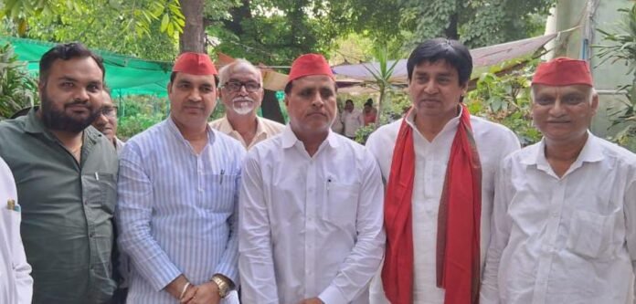 SP official with Praveen Pratap Radhe