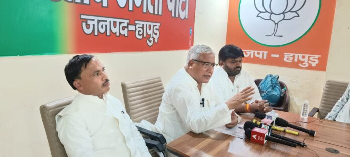 MP Rajendra Agarwal talking to journalists